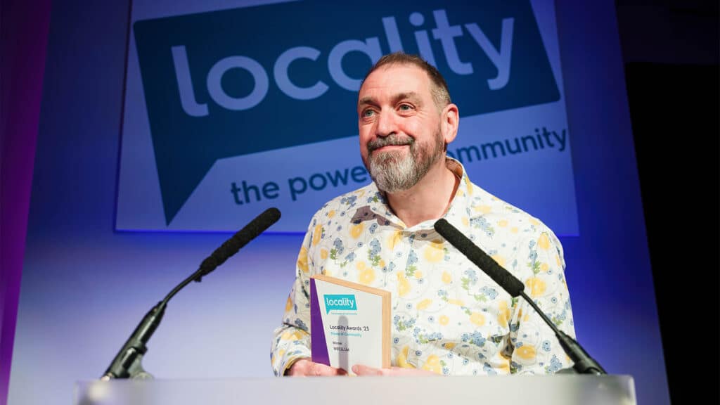 Dominic Ellison accepts Locality award